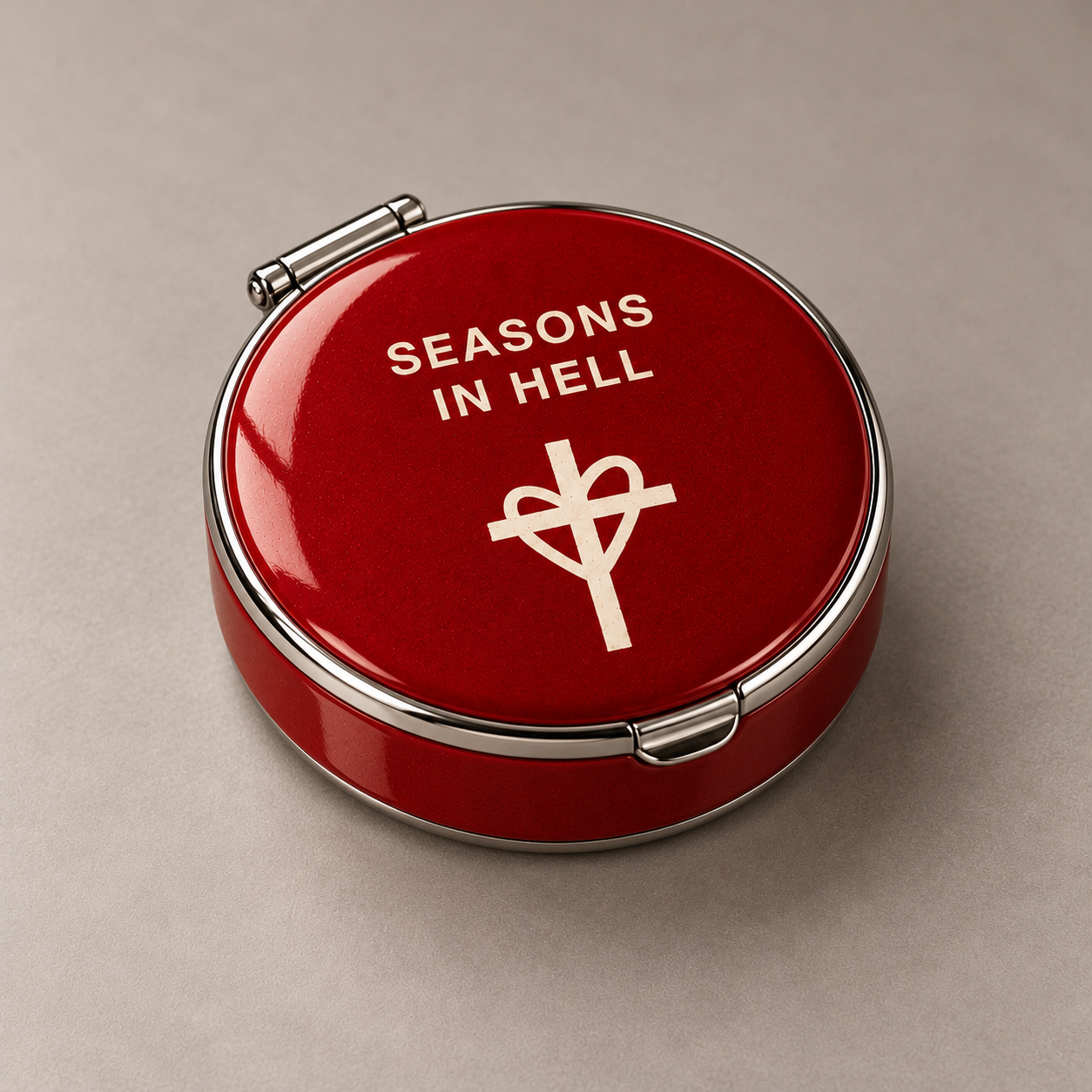 Red circular portable ashtray with heart and cross