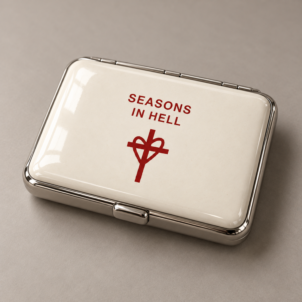White Cigarette Case with Seasons In Hell lettering and heart and cross